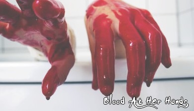 Blood At Her Hands